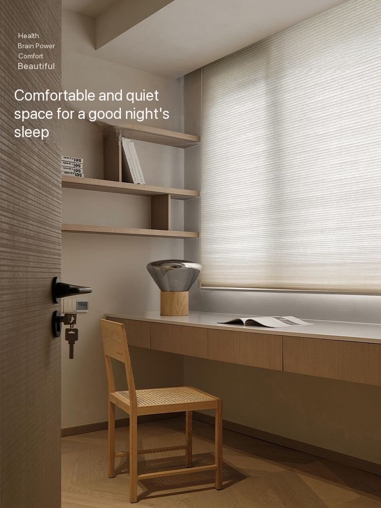 Honeycomb cellular shade in a warm neutral study window